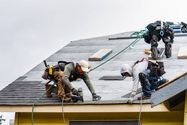 Professional Roofing technician working in Russia, OH